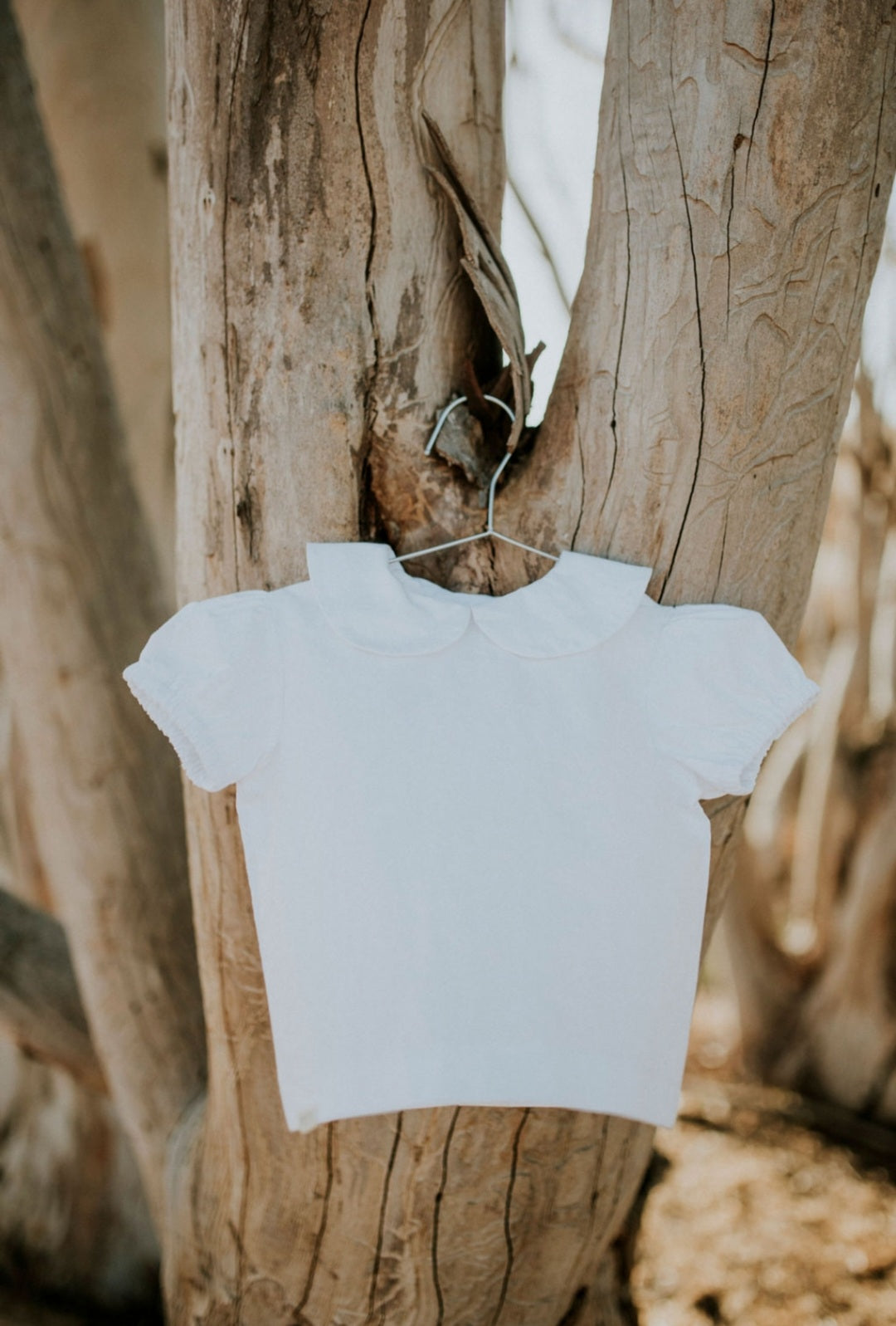 White short sleeve button blouse